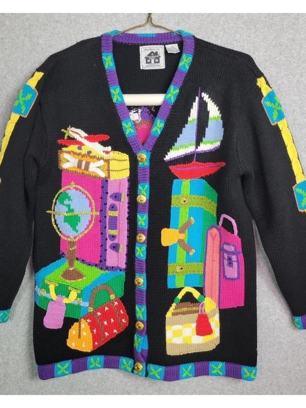 Storybook Knits Black Novelty Cardigan with Bright Travel Motif Accents